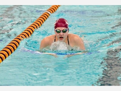 Dexter Swim and Dive Cruises Past Bedford