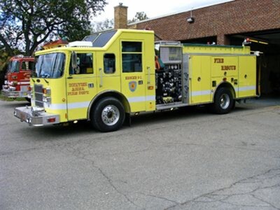 Two new badges and a contract for the Dexter Area Fire Department